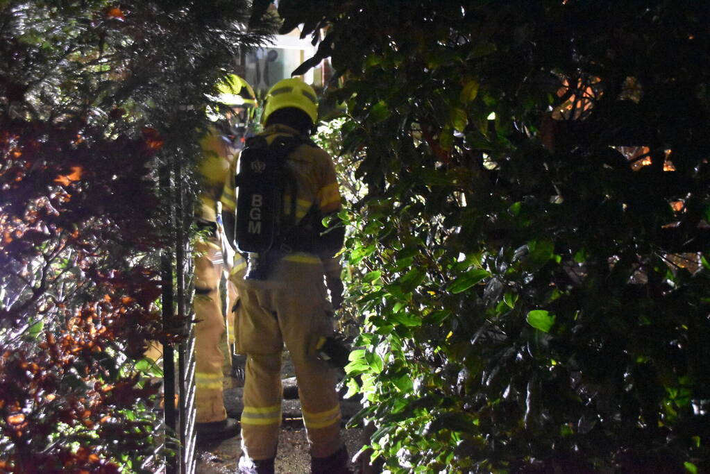 Containerhok verwoest door brand