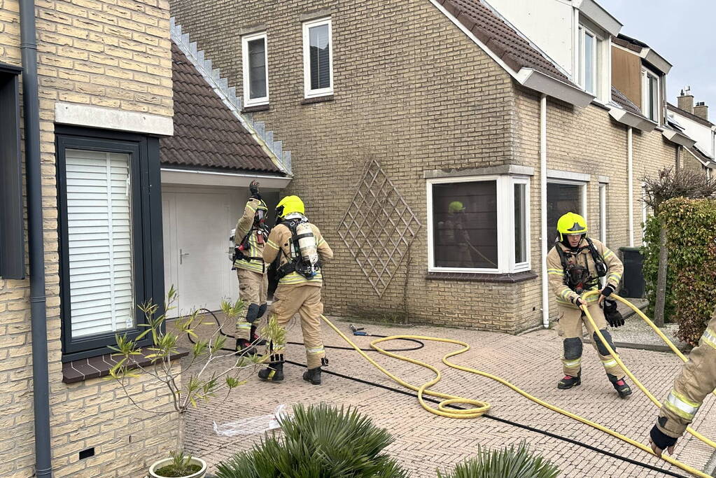 Woning vol rook door brand