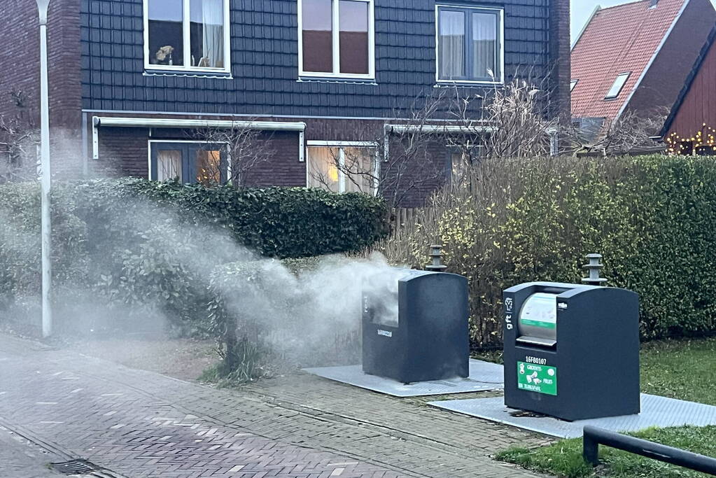 Ondergrondse container in brand