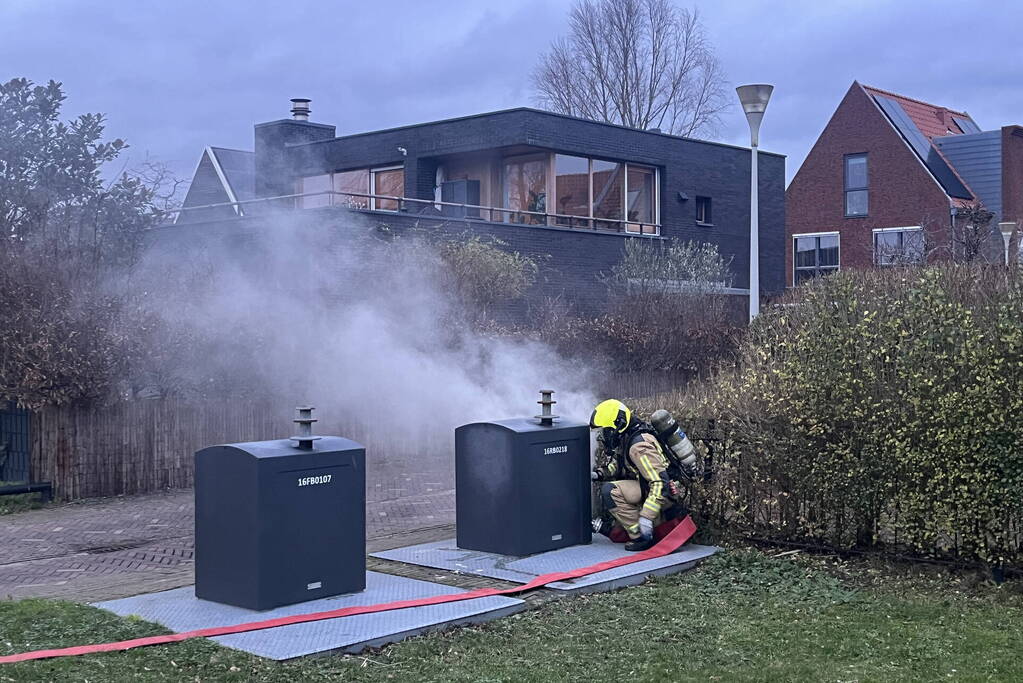 Ondergrondse container in brand
