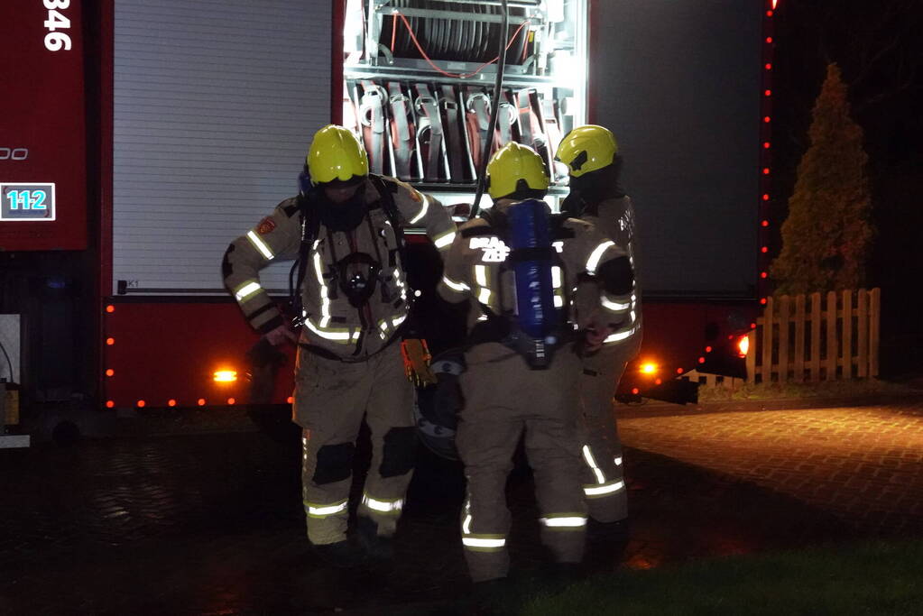 Felle brand in coniferenhaag