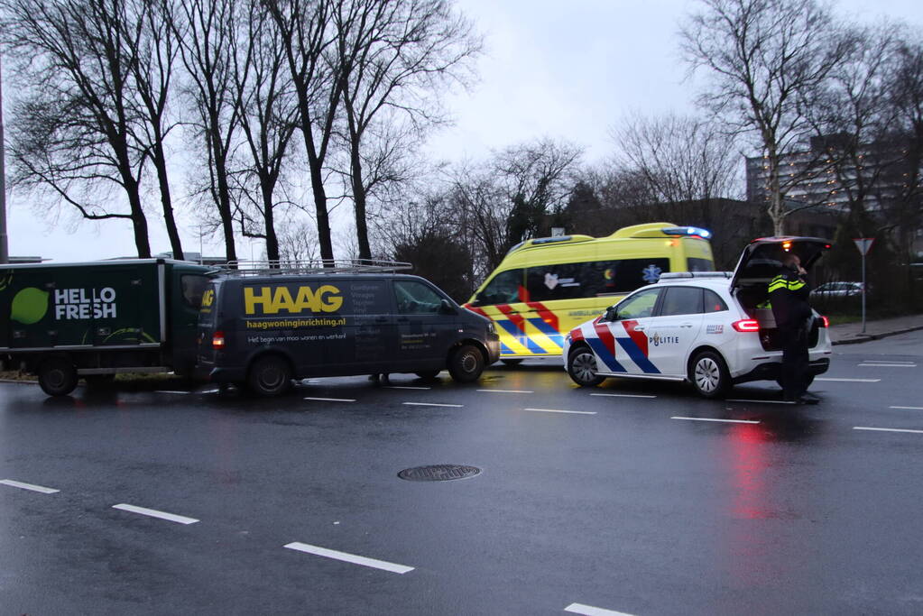 Twee bedrijfsbussen op elkaar geklapt