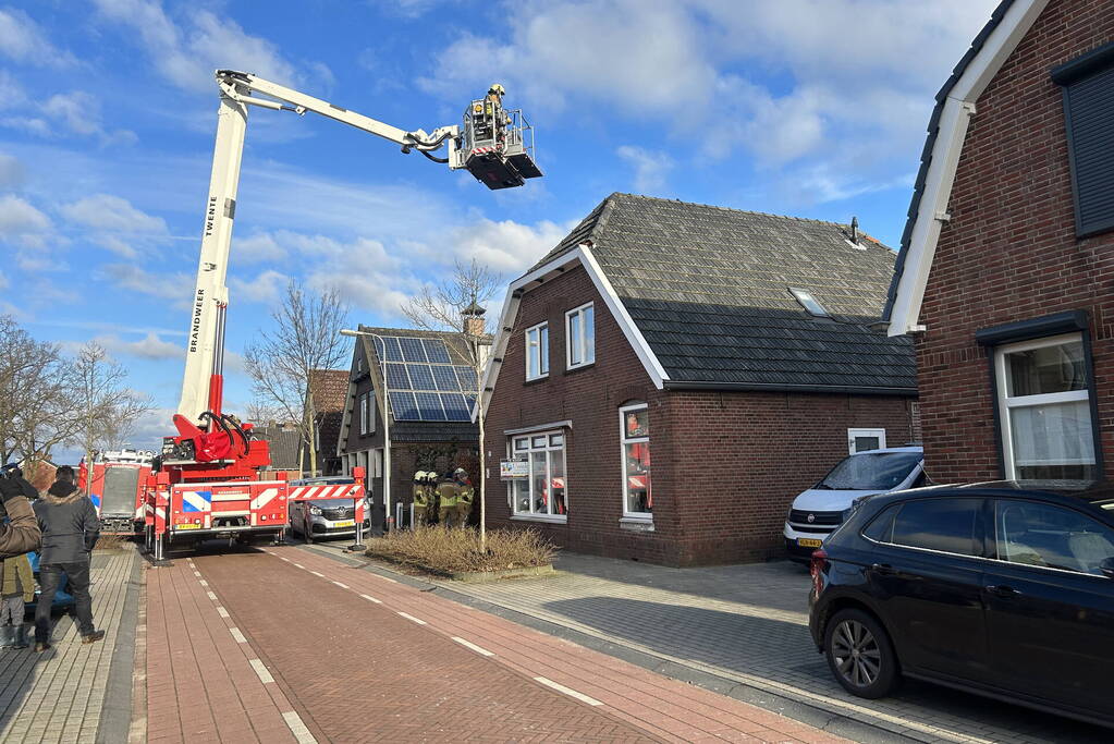 Schoorsteen geveegd na brand