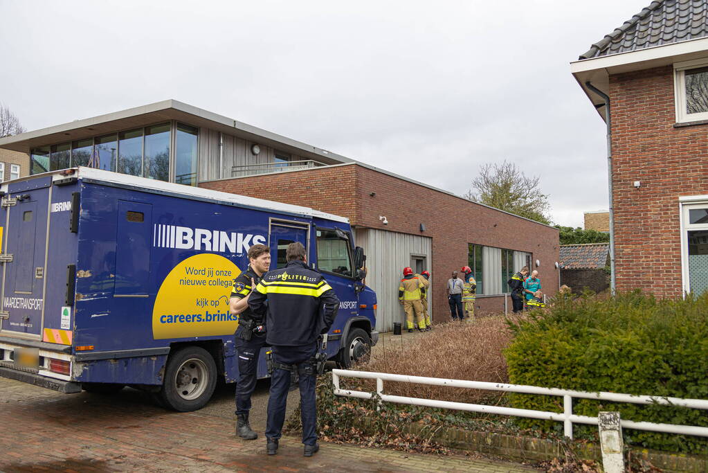 Geldloper vast in deur