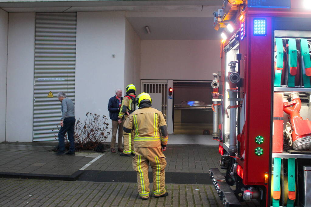 Rookontwikkeling in garage van flat