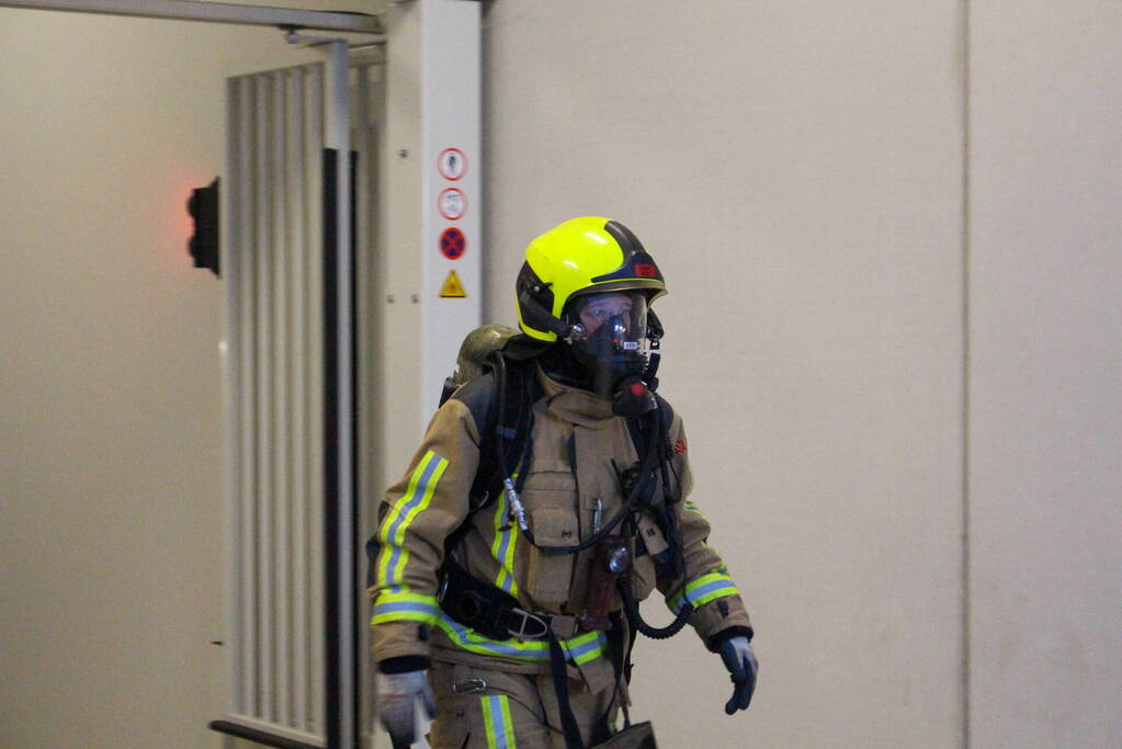 Rookontwikkeling in garage van flat