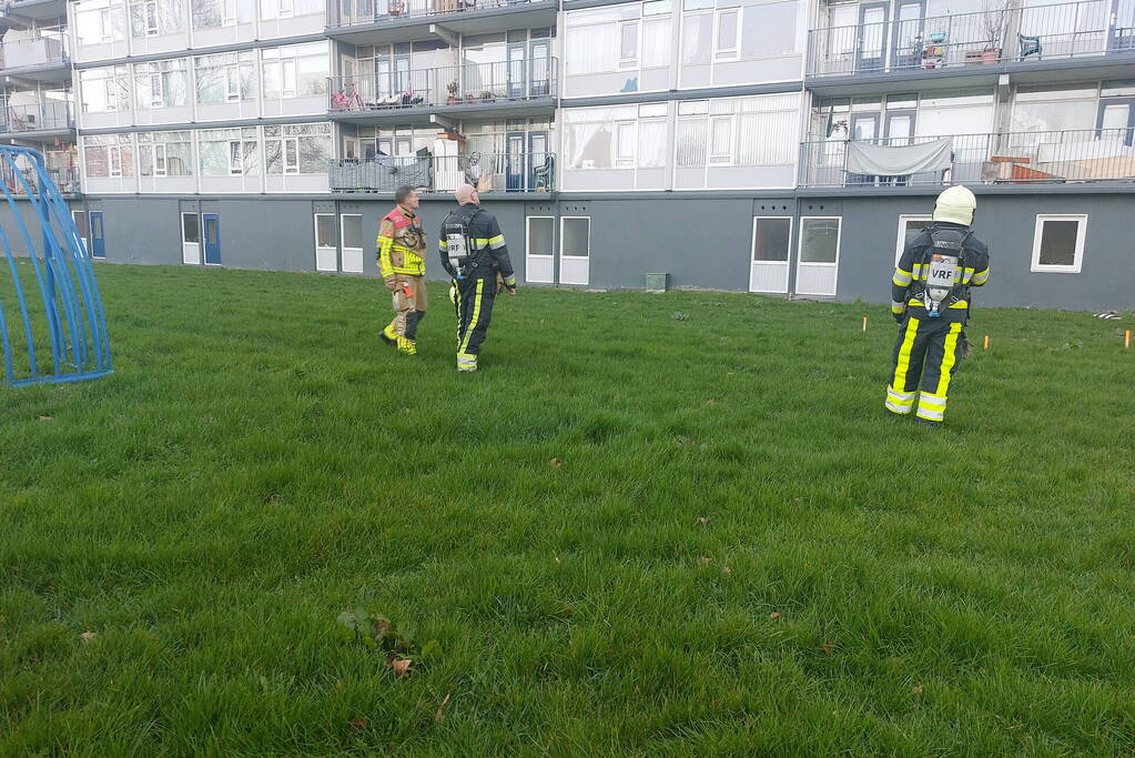 Rookoverlast door barbecue op balkon