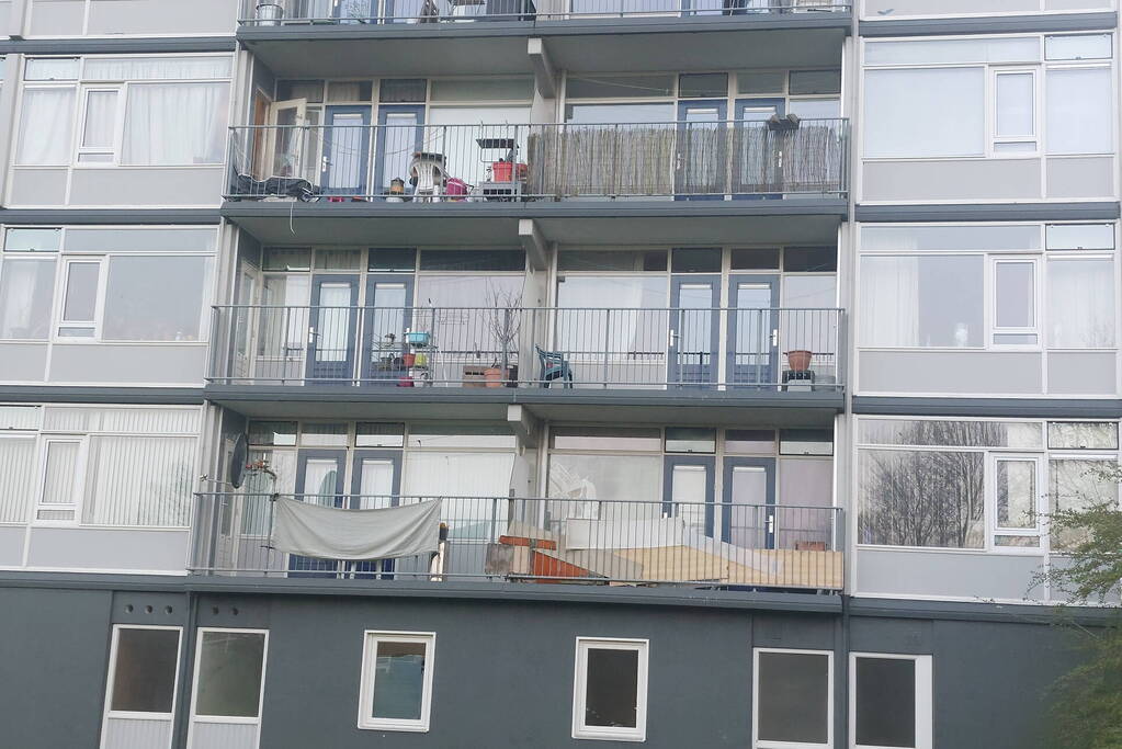 Rookoverlast door barbecue op balkon