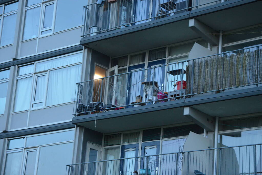 Rookoverlast door barbecue op balkon