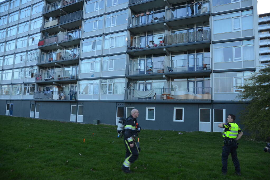 Rookoverlast door barbecue op balkon