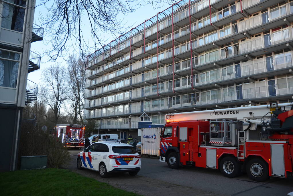Rookoverlast door barbecue op balkon
