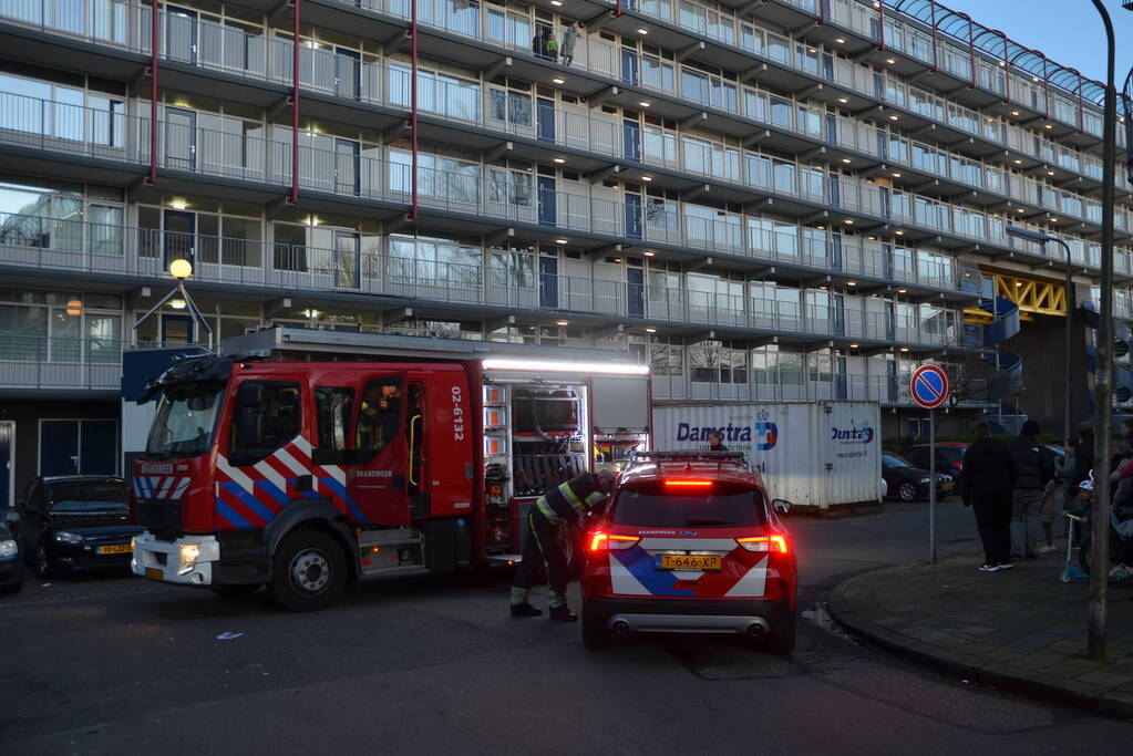 Rookoverlast door barbecue op balkon