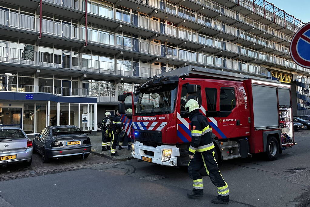 Rookoverlast door barbecue op balkon