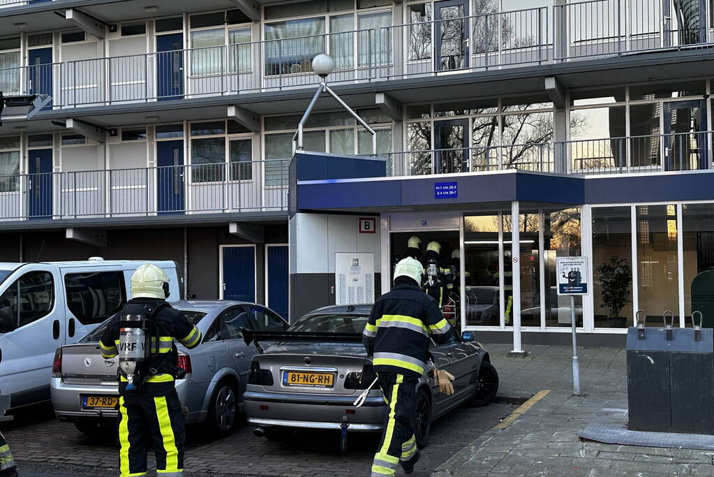 Rookoverlast door barbecue op balkon