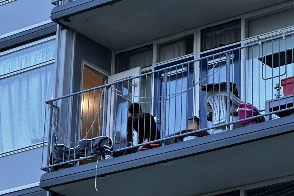 Rookoverlast door barbecue op balkon