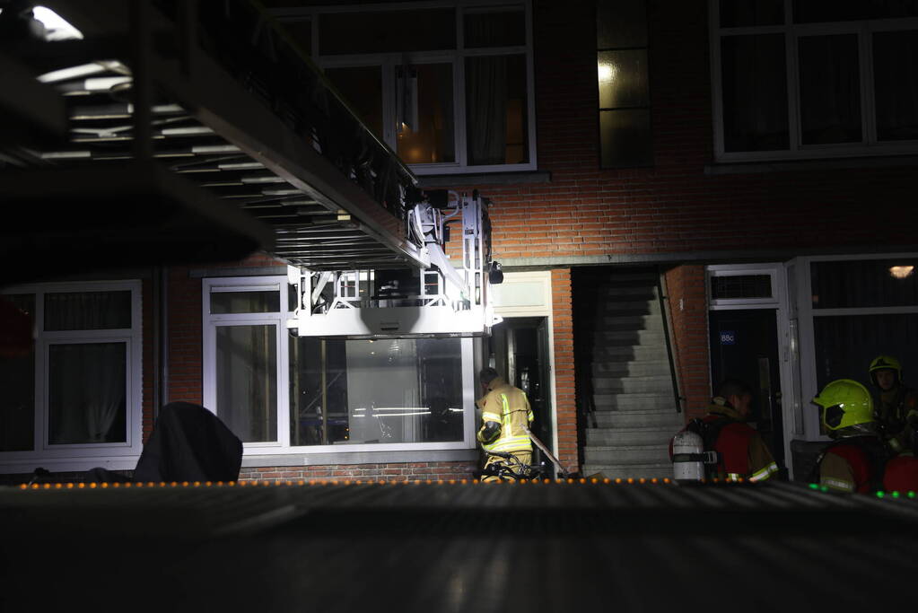 Brand in portiekwoning snel geblust