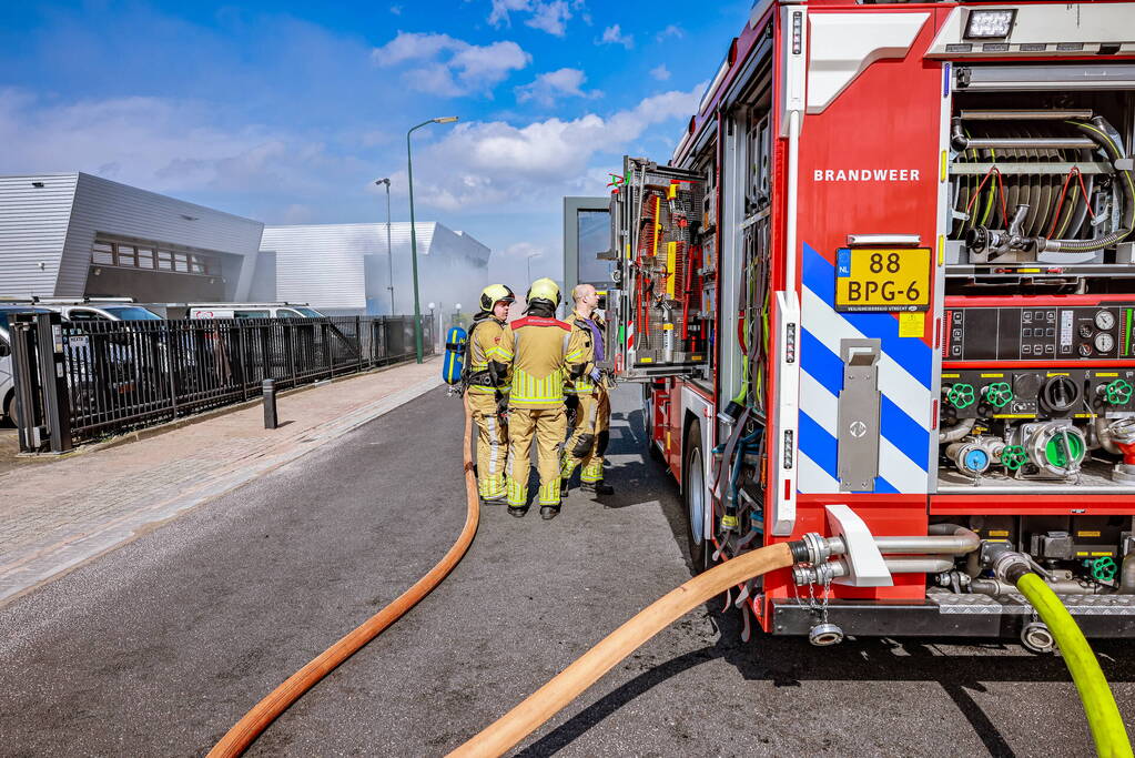 Brand in bouwafval container