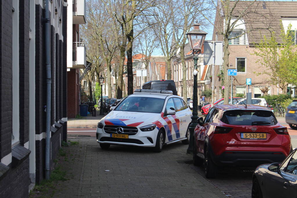 Grote schade door brandende scooter onder overkapping