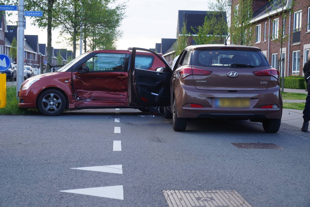 Schade na botsing op kruising