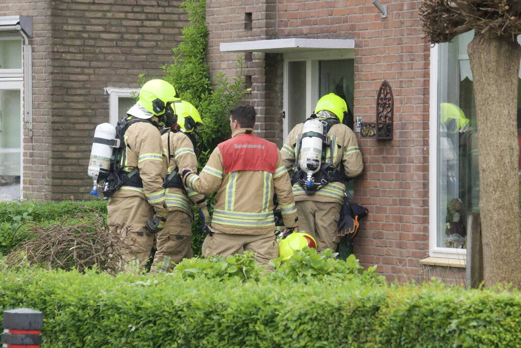 Deur ingebeukt na pannetje op het vuur