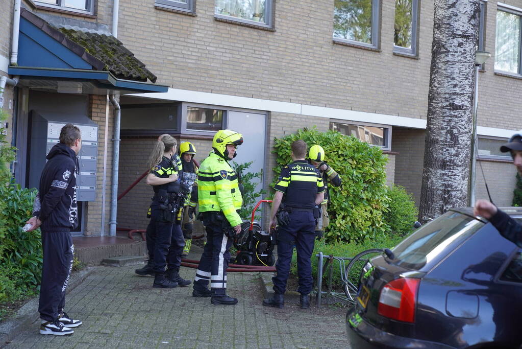 Persoon gewond bij woningbrand