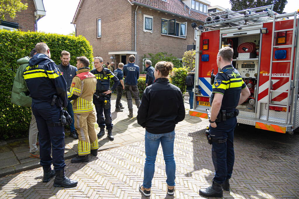 Klusjesmannen blussen brand in woning