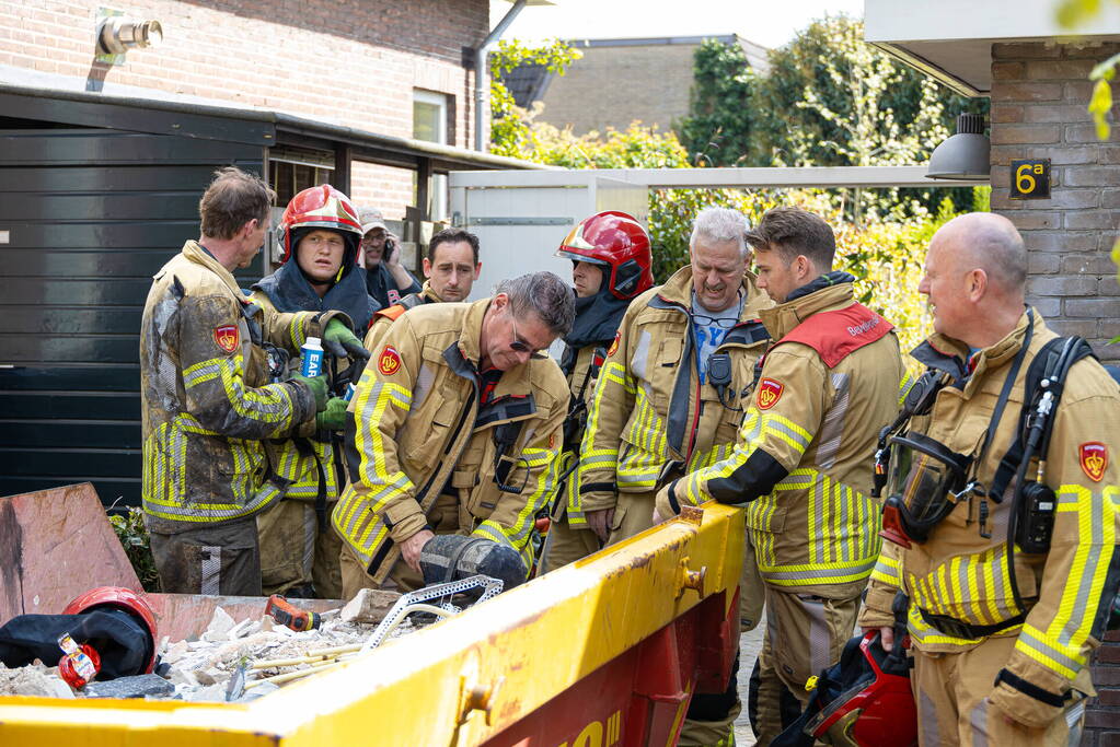 Klusjesmannen blussen brand in woning