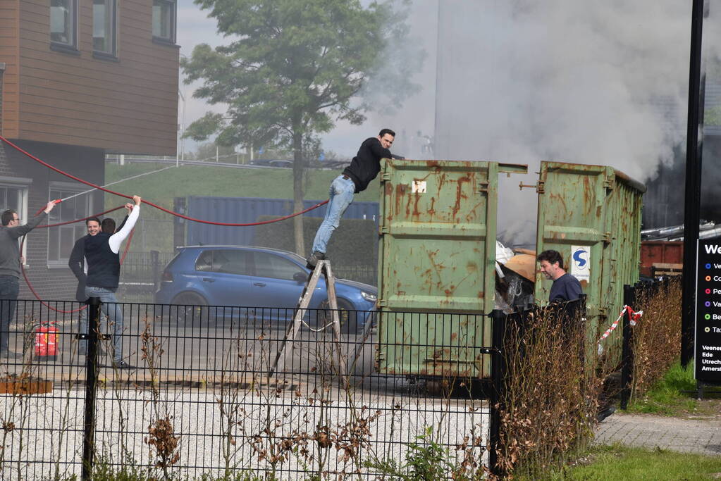 Veel rookontwikkeling bij brand in container