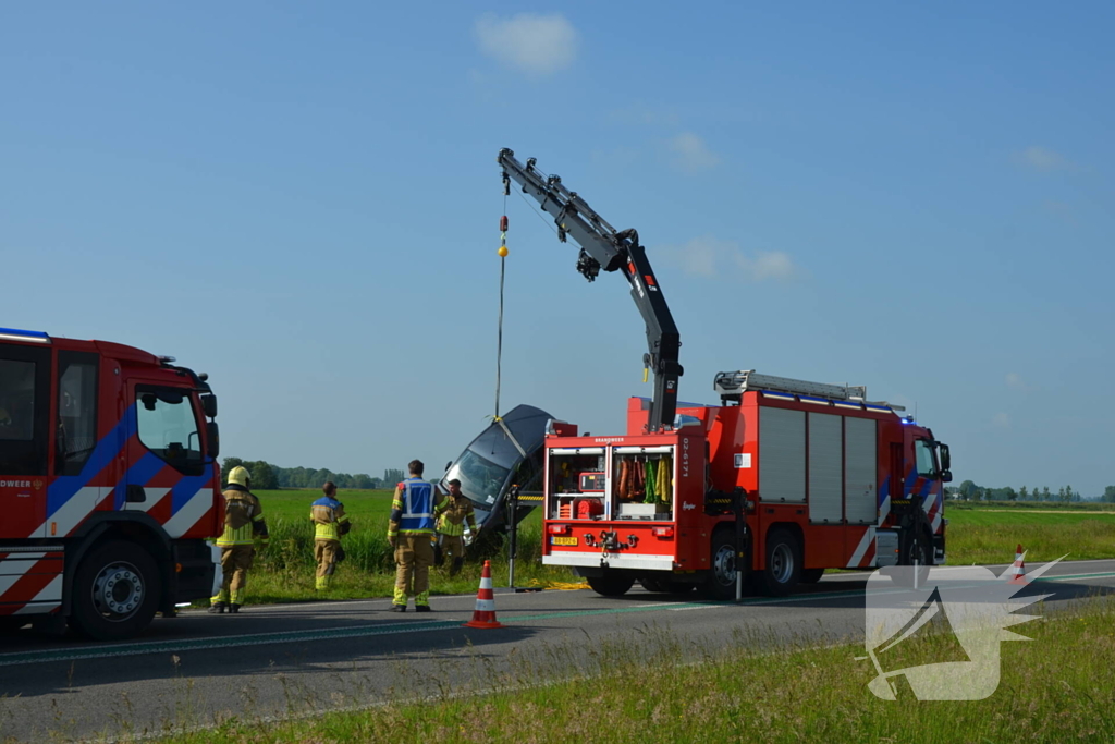 Hulpdiensten groots ingezet voor voertuig te water