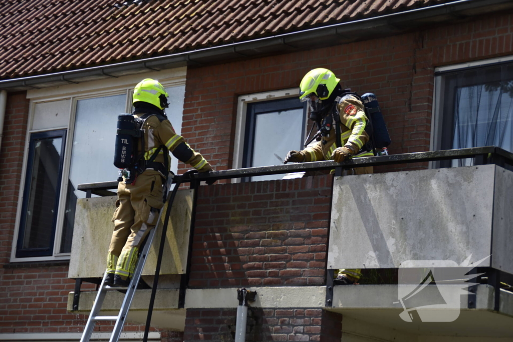 Airco unit op balkon vliegt in brand