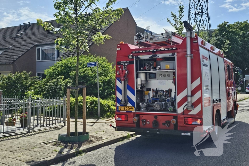 Brandweer forceert voordeur wegens brand