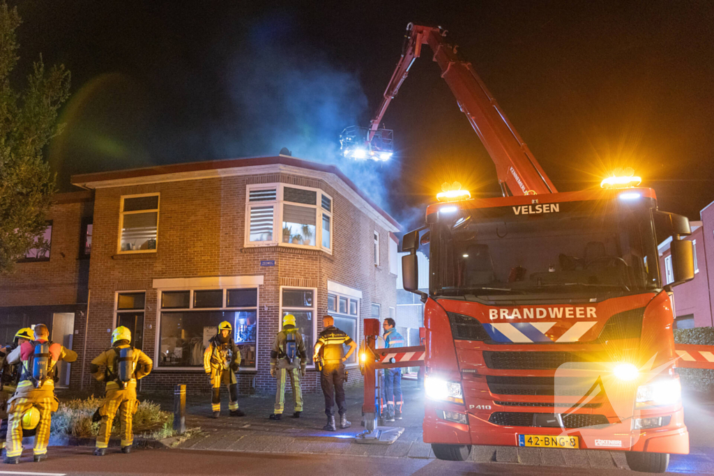 Bewoner springt van balkon om aan de vlammen te ontkomen