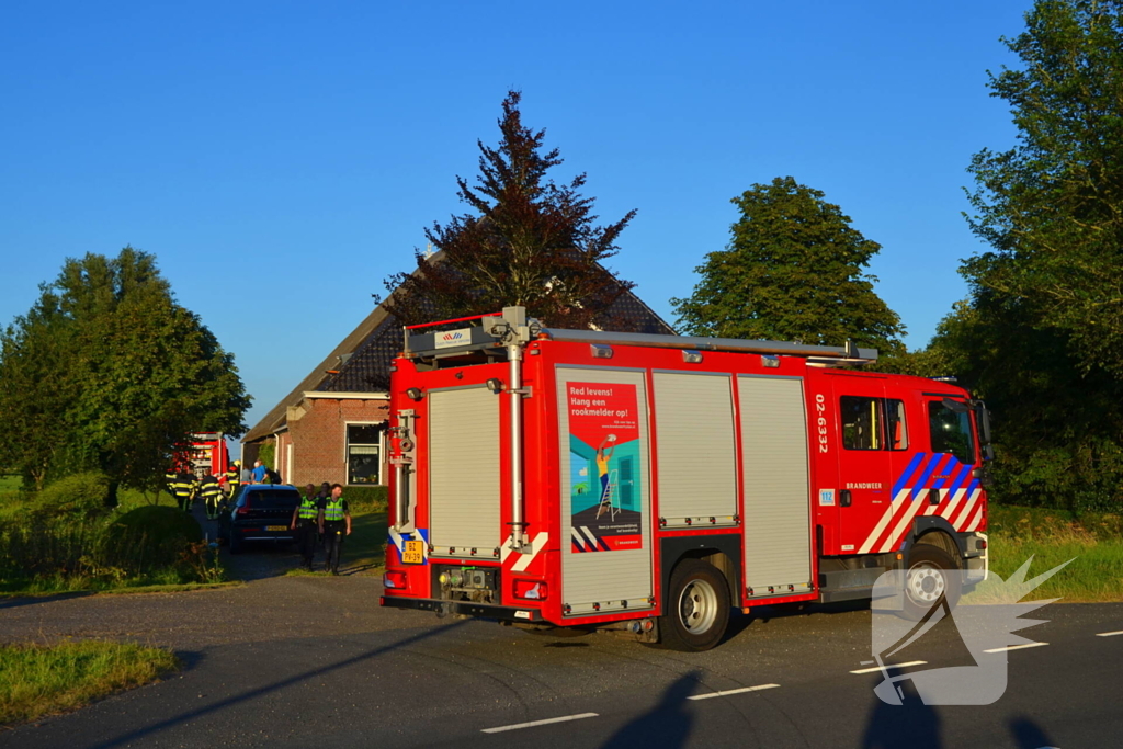 Brand in grasmaaier in woonboerderij