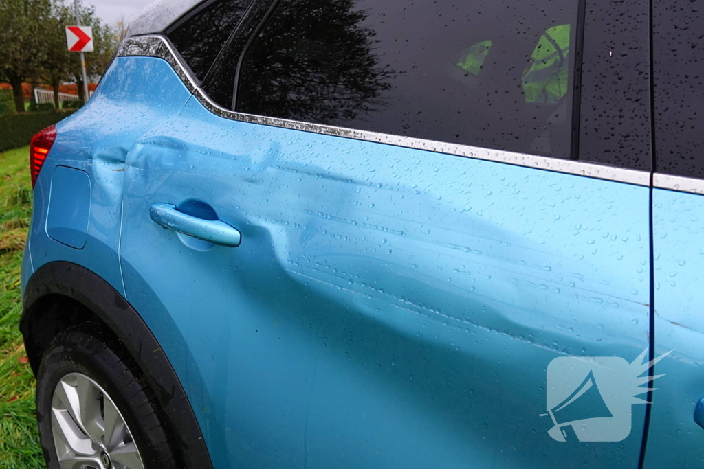 Auto ramt hekwerk kapot