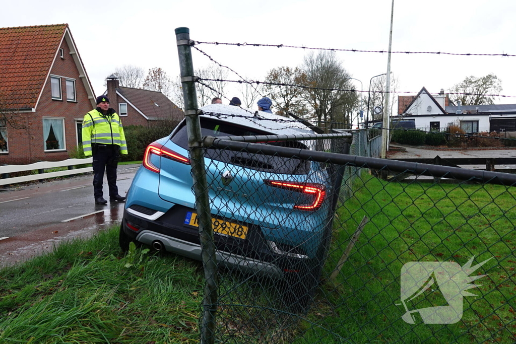 Auto ramt hekwerk kapot
