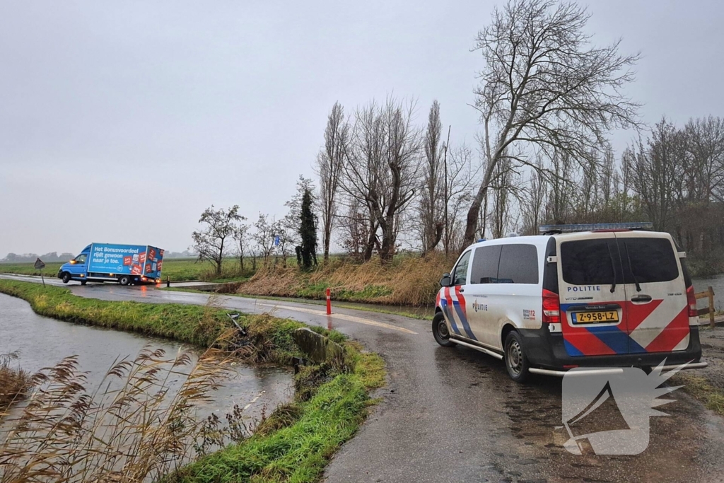 Boodschappenbezorger bijna te water