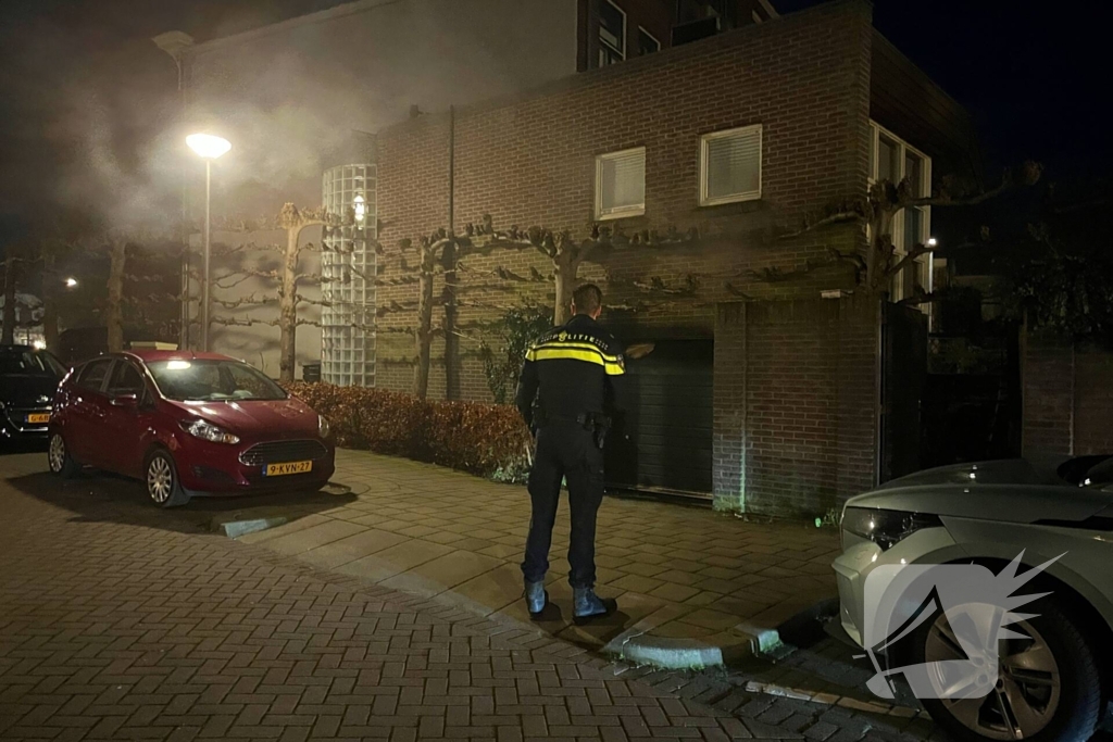 Brand in garage van woning