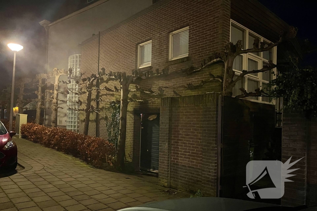 Brand in garage van woning