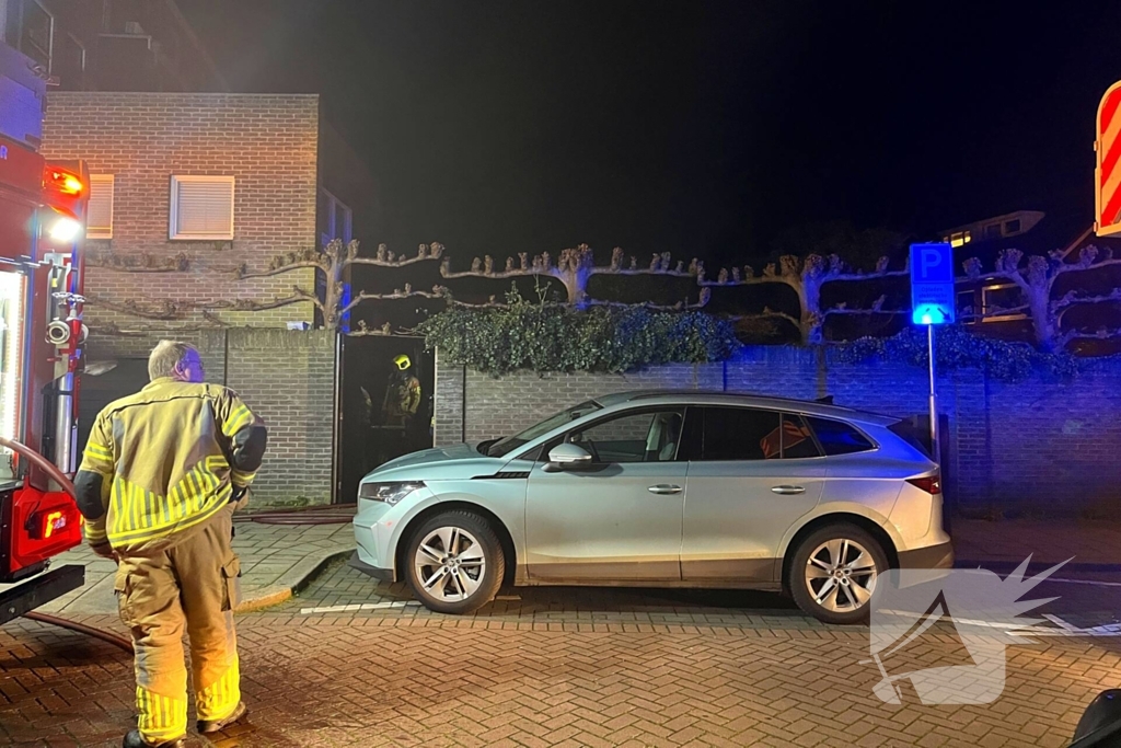 Brand in garage van woning