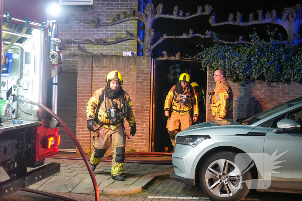 Brand in garage van woning