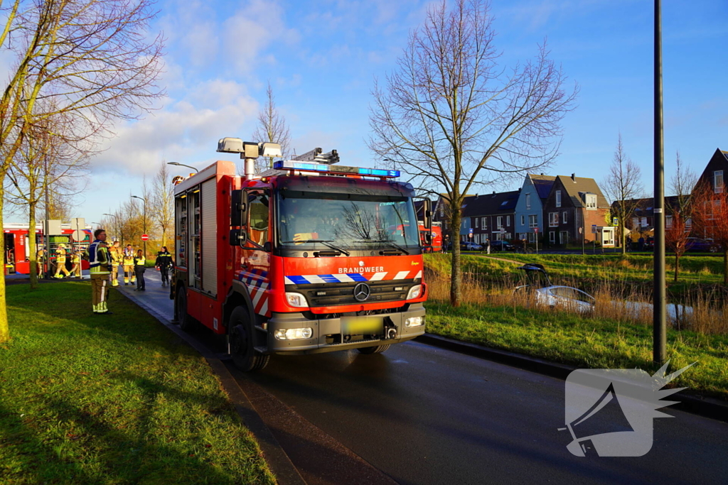 Auto te water na aanrijding