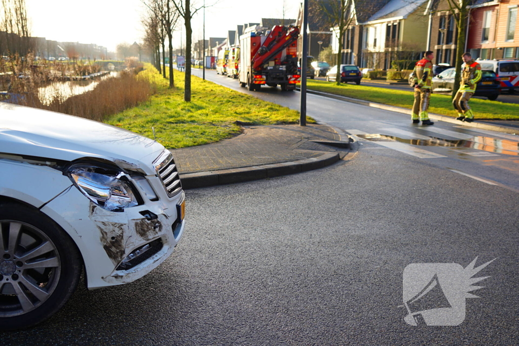 Auto te water na aanrijding