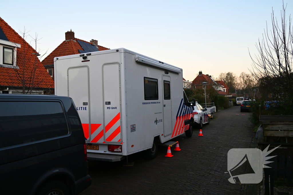 Forensische opsporing doet onderzoek in woning
