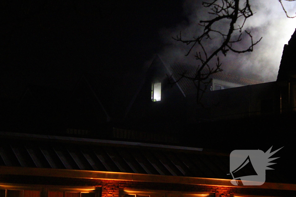 Veel rook bij brand in woning