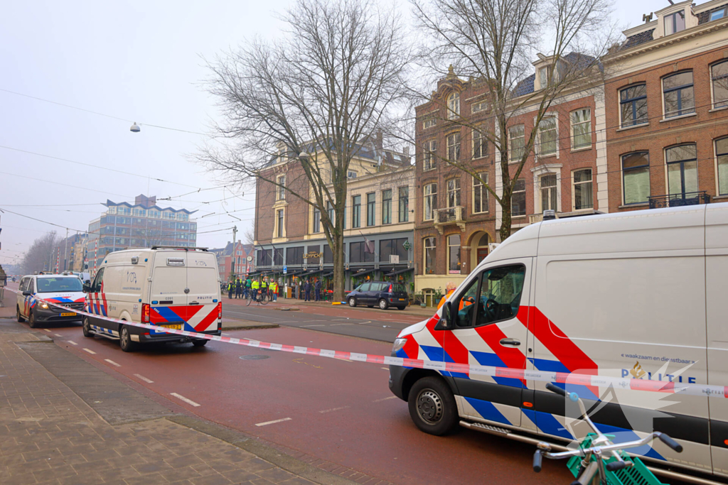 Kind bekneld onder tram