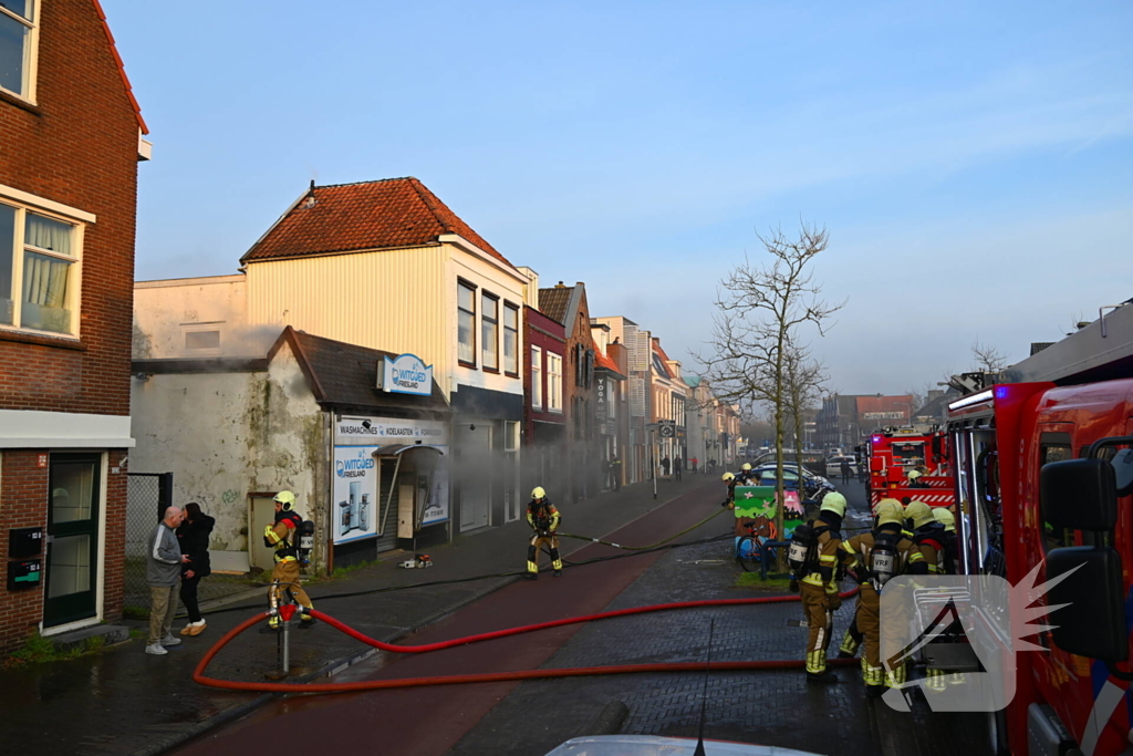 Flinke rookontwikkeling bij brand in winkel