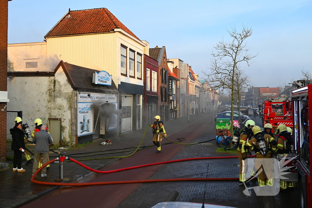 Flinke rookontwikkeling bij brand in winkel