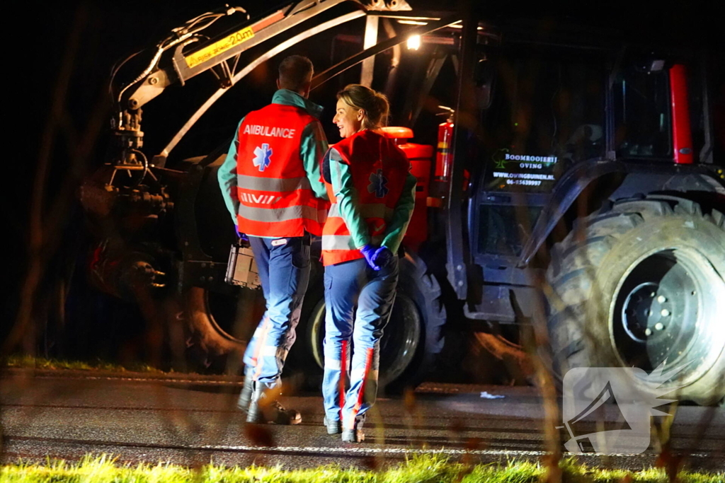 Trekker en auto in botsing