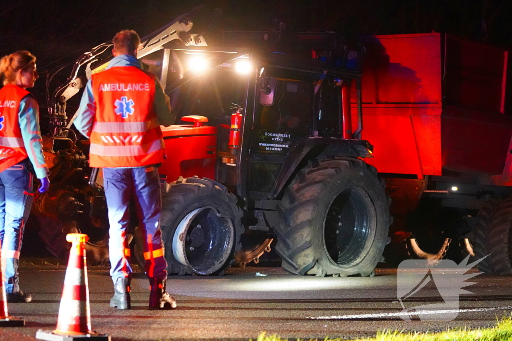 Trekker en auto in botsing