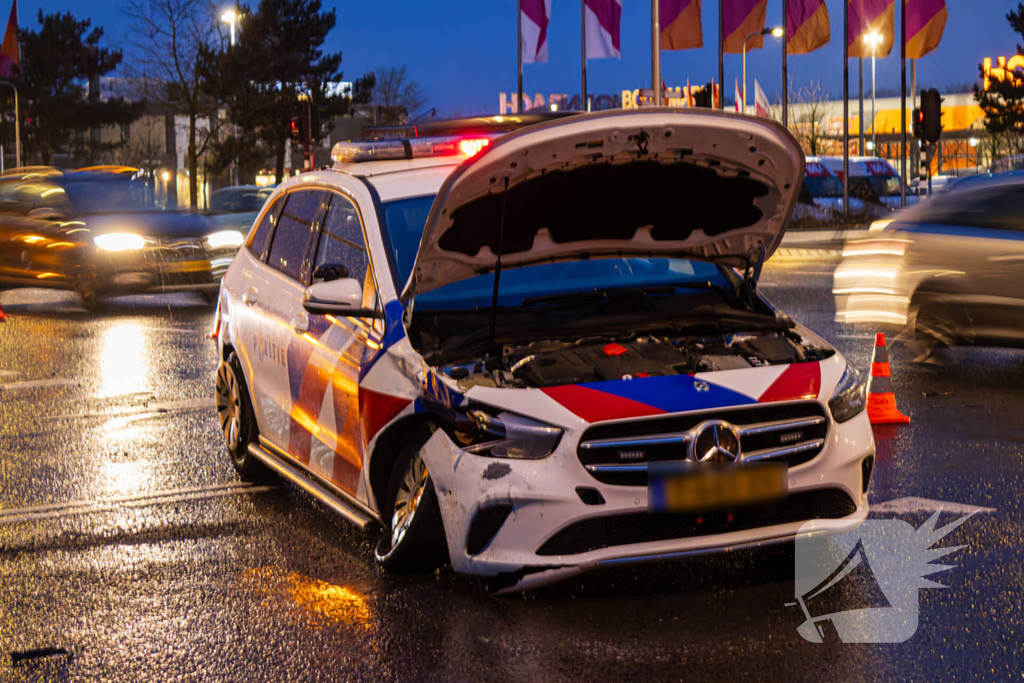Forse schade na ongeval met politieauto